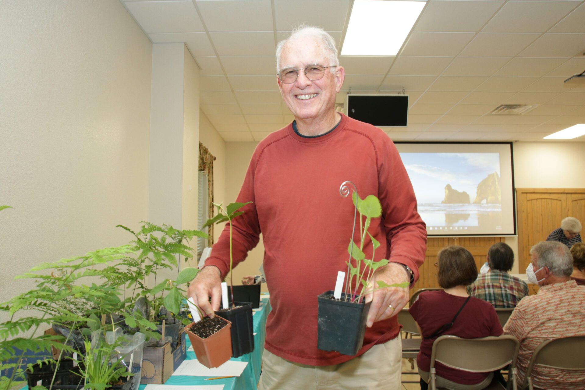 Happy Triangle Chapter Member David White with his auction purchases