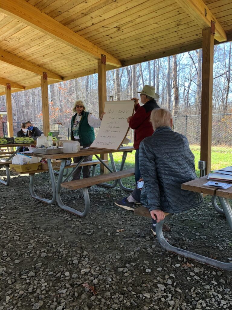 Lynda Waldrep demonstrates how to sow seeds from native plants