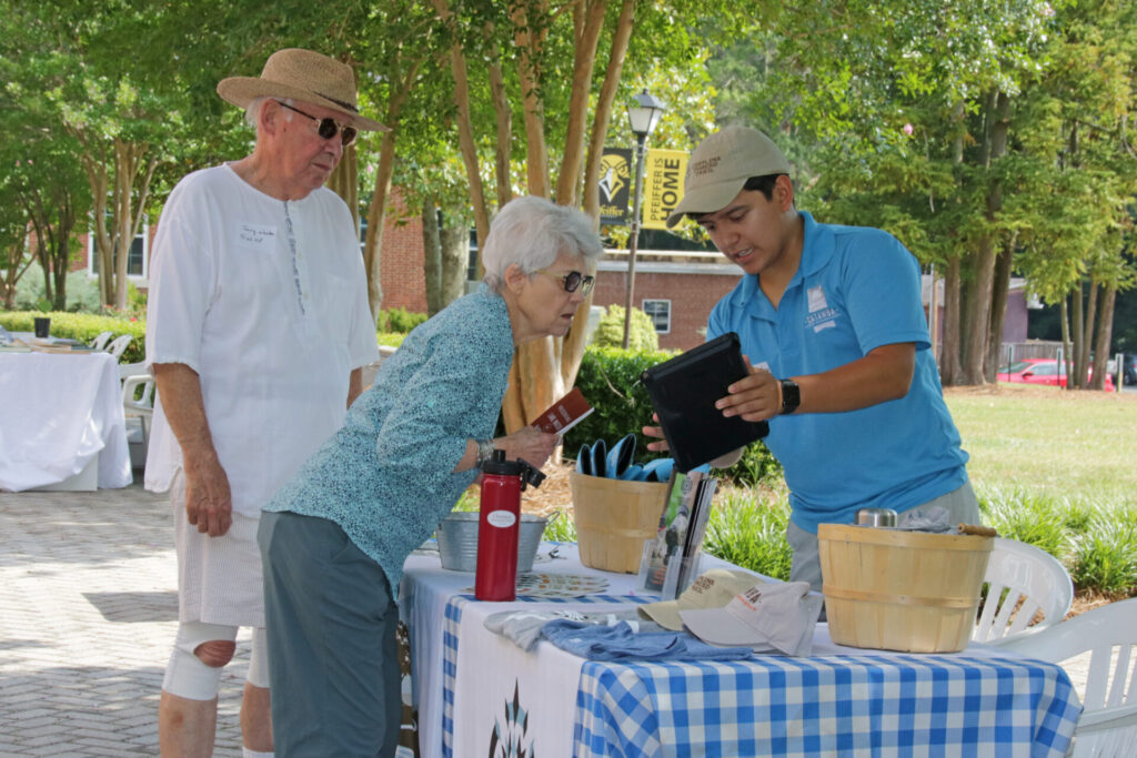 NCNPS members Jerry and Anna Weston get some advice